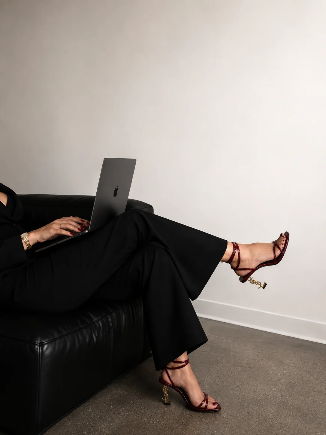 Content creator working on laptop while building her brand
